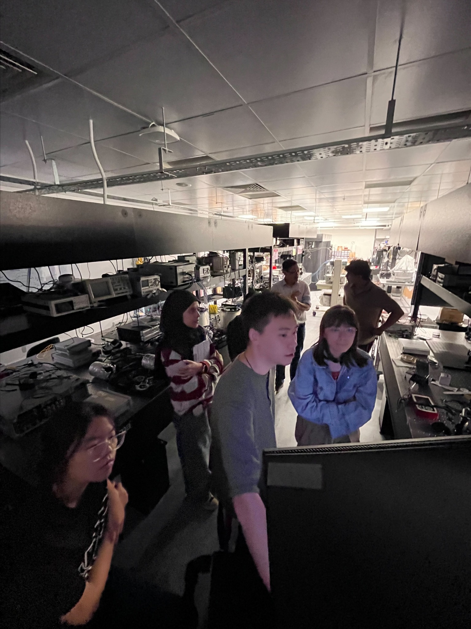 Researchers visiting the QSE Lab experimental laboratory
